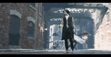 a man in a black vest is walking down a street with a dog behind him .
