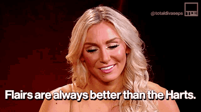 a woman with blonde hair is smiling with the words `` flairs are always better than the harts '' .