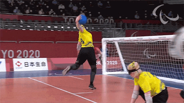 a man in a yellow shirt with the number 8 on it