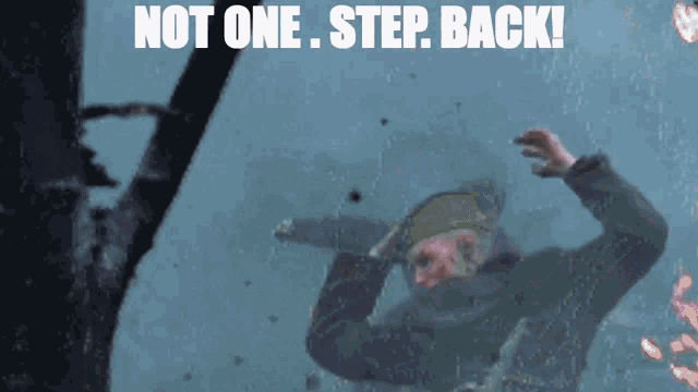a picture of a person with the words not one step back