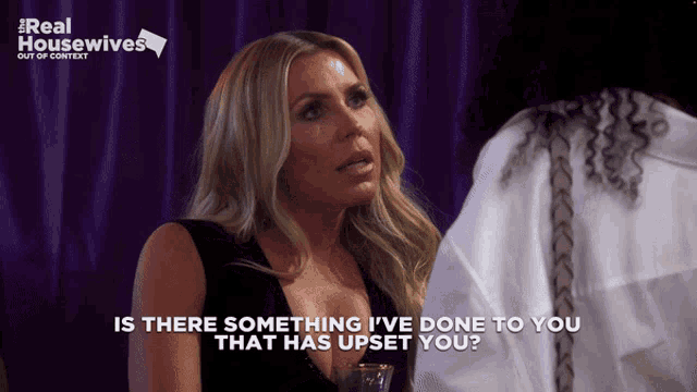 a woman says " is there something i 've done to you that has upset you " on a television screen