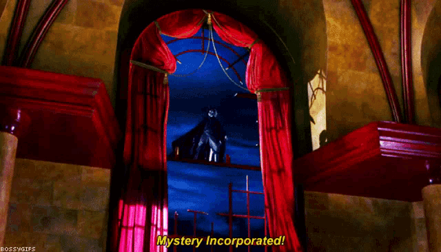 a room with a red curtain and the words mystery incorporated above it