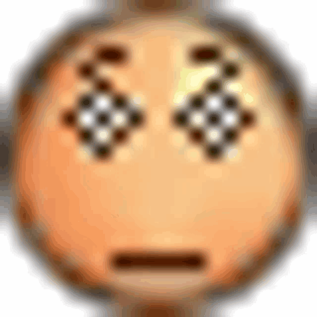 a close up of a smiley face with a slight smirk on it 's face .