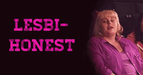 a woman in a purple shirt is sitting next to a sign that says ' lesbi-honest ' .