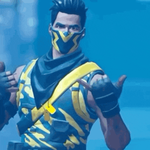 a man is wearing a mask and giving a thumbs up .