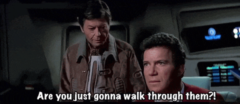 two men standing next to each other with the words " are you just gonna walk through them "