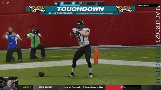 a football game is being played on a screen that says touchdown like a book enabled