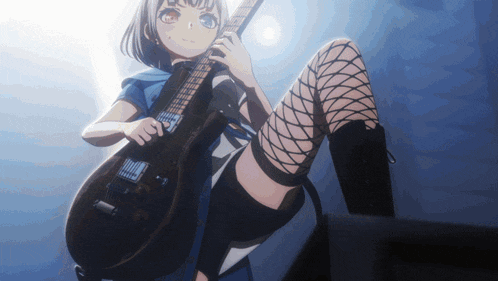 a girl in fishnet stockings playing a guitar