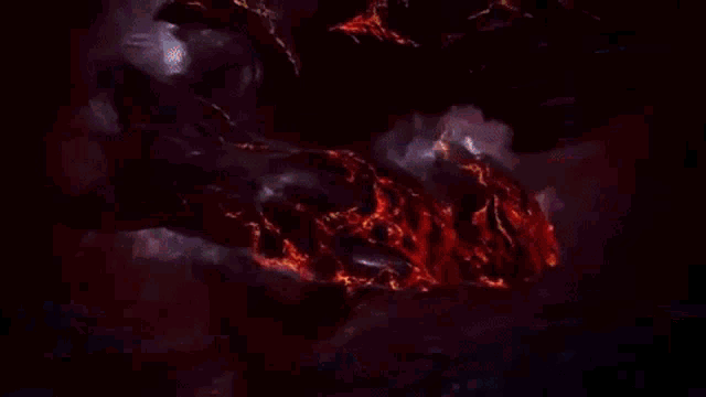 a dragon is flying through the air with flames coming out of it 's wings .