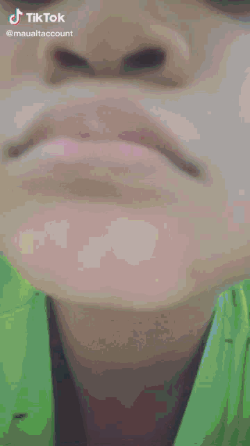 a close up of a person 's mouth with a tik tok watermark