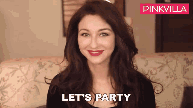 a woman says let 's party in front of a pinkvilla ad