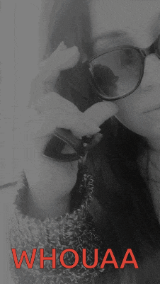 a black and white photo of a woman wearing sunglasses and the word whouaa in red