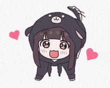 a cartoon girl wearing a black bear costume