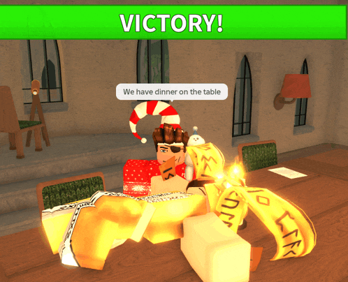 a cartoon character is sitting at a table with a green sign that says " victory "