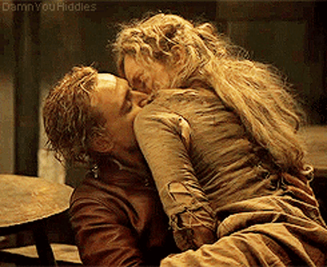 a man and a woman are kissing with the words damn you riddles written on the bottom