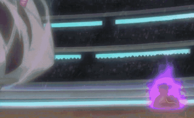 a purple flame is coming out of the ground in a dark room