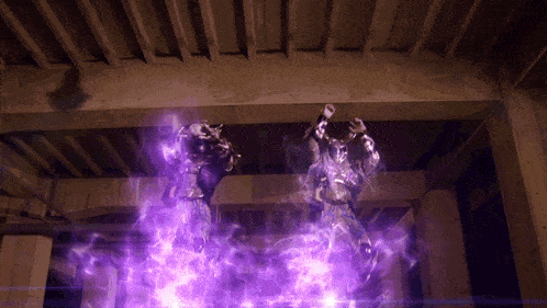 a purple light is coming out of the ceiling of a building