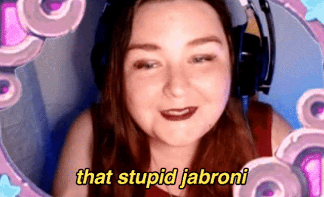 a woman wearing headphones says that stupid jabroni in yellow letters