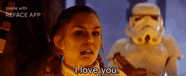 a woman is talking to a stormtrooper in a star wars movie .