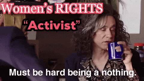a woman drinking from a blue mug with the words women 's rights " activist " written above her