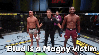 two men are standing next to each other in a boxing ring with the words blud is a magny victim on the bottom
