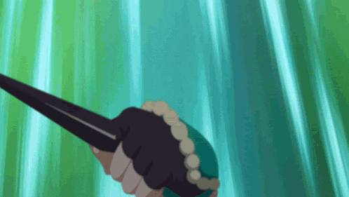 a person is holding a sword in their hand with a green background