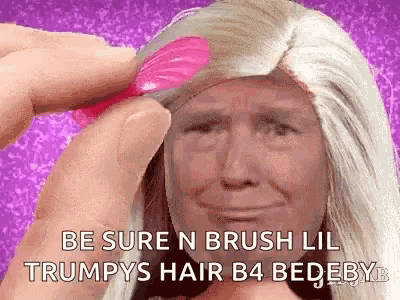 a barbie doll with donald trump 's face on it is being brushed with a pink comb .