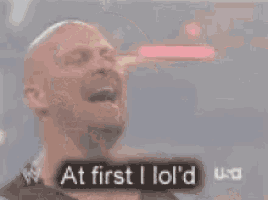 a bald man is standing in front of a sign that says `` then i serious d '' .