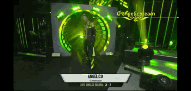 a person standing on a stage with the name angelico on the bottom