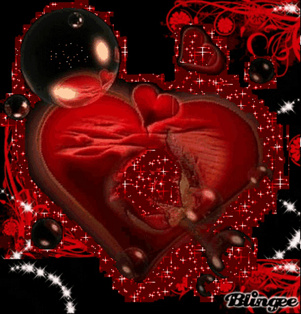a picture of a red heart with the word blingee in the corner