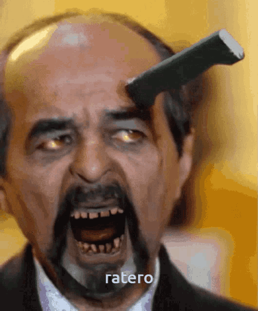 a man with a knife on his forehead has the word ratero on the bottom right