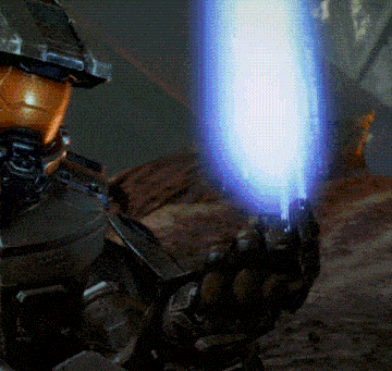 a man in a helmet is holding a blue light