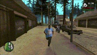 a man in a blue shirt is running down a street in a video game with the time at 11:36