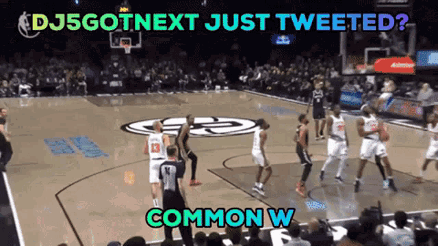 a basketball game is being played in front of a crowd with the words dj5gotnext just tweeted