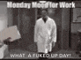 a man in a lab coat is walking down a hallway in a room .