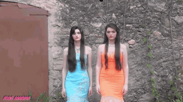 two women standing next to each other in front of a wall with the words blog marie written on the bottom