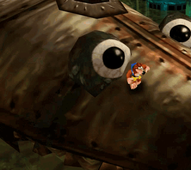 a cartoon character with big eyes is standing next to a giant fish