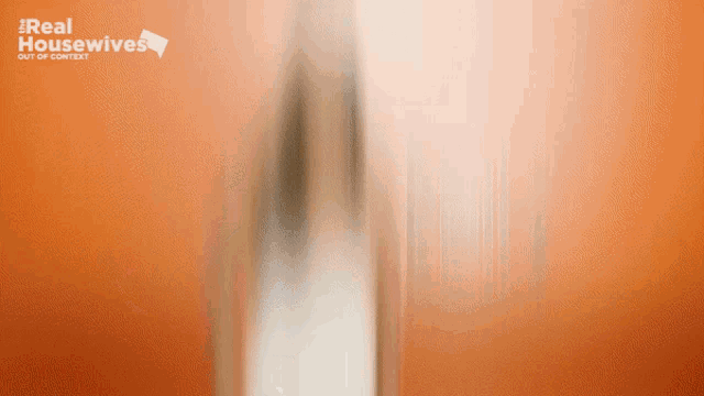 a real housewives advertisement with a blurred image
