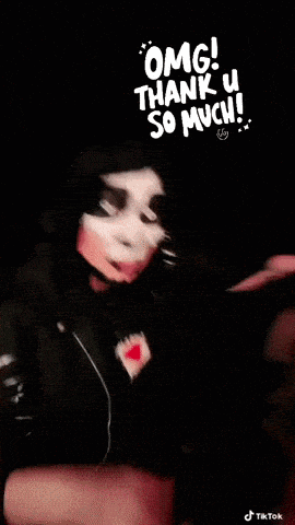 a man and a woman with their faces painted and the words " omg thank u so much " on the bottom