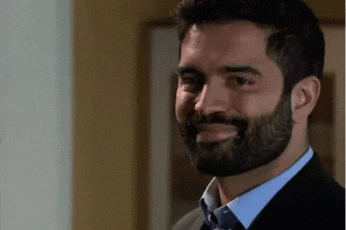 Imran Fake Smiles Then Sadly Frowns Coronation Street Made By The Talk Of The Street GIF - Imran Fake Smiles Then Sadly Frowns Coronation Street Made By The Talk Of The Street Coronation Street GIFs