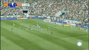 a soccer game is being played in a stadium and the score is 1 to 2