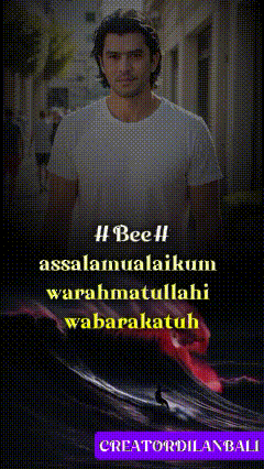 a man in a white t-shirt is standing in front of a building with the words " beeh " written on it