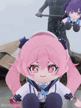 a stuffed doll with pink hair is sitting in front of a pile of boxes