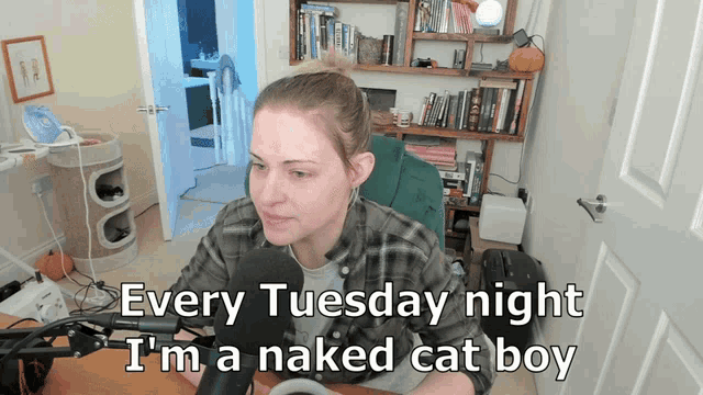a woman sitting in front of a microphone with the words every tuesday night i 'm a naked cat boy