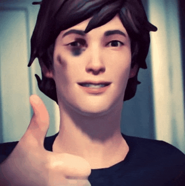 a man with a black spot on his face gives a thumbs up