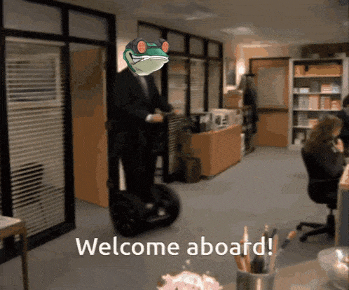 a frog is riding a segway in an office with the words welcome aboard