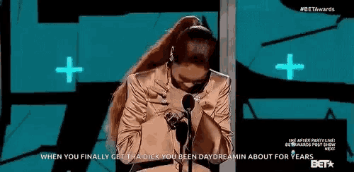 a woman speaking into a microphone with the words " when you finally get the dick you been daydreamin about for years "