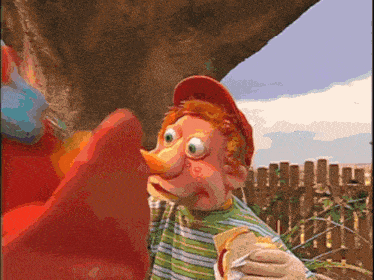 a cartoon character is eating a sandwich with ketchup and mustard