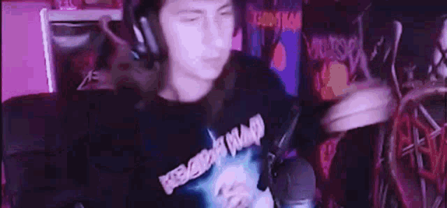 a person wearing a t-shirt with a picture of a dog on it .