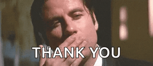 a man in a suit is covering his mouth with his hand and the words thank you are below him .